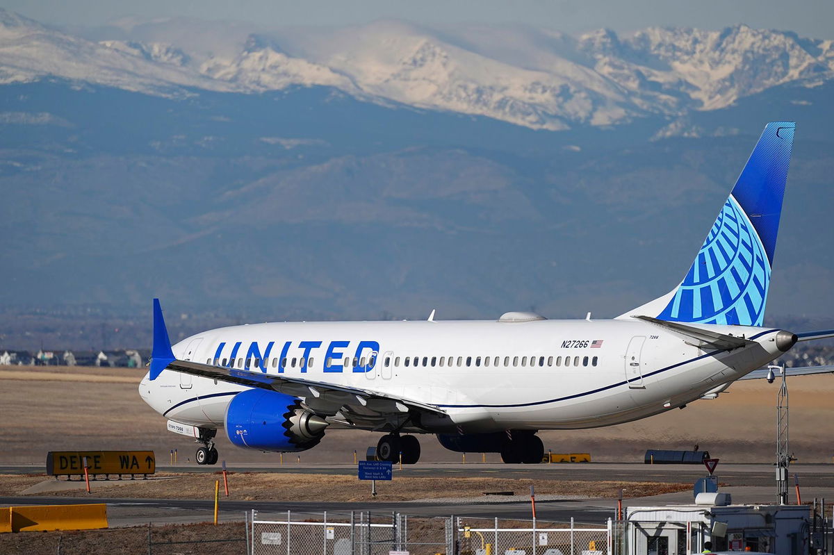 <i>David Zalubowski/AP via CNN Newsource</i><br/>A United Airlines jetliner taxis down a runway for takeoff at Denver International Airport on December 24