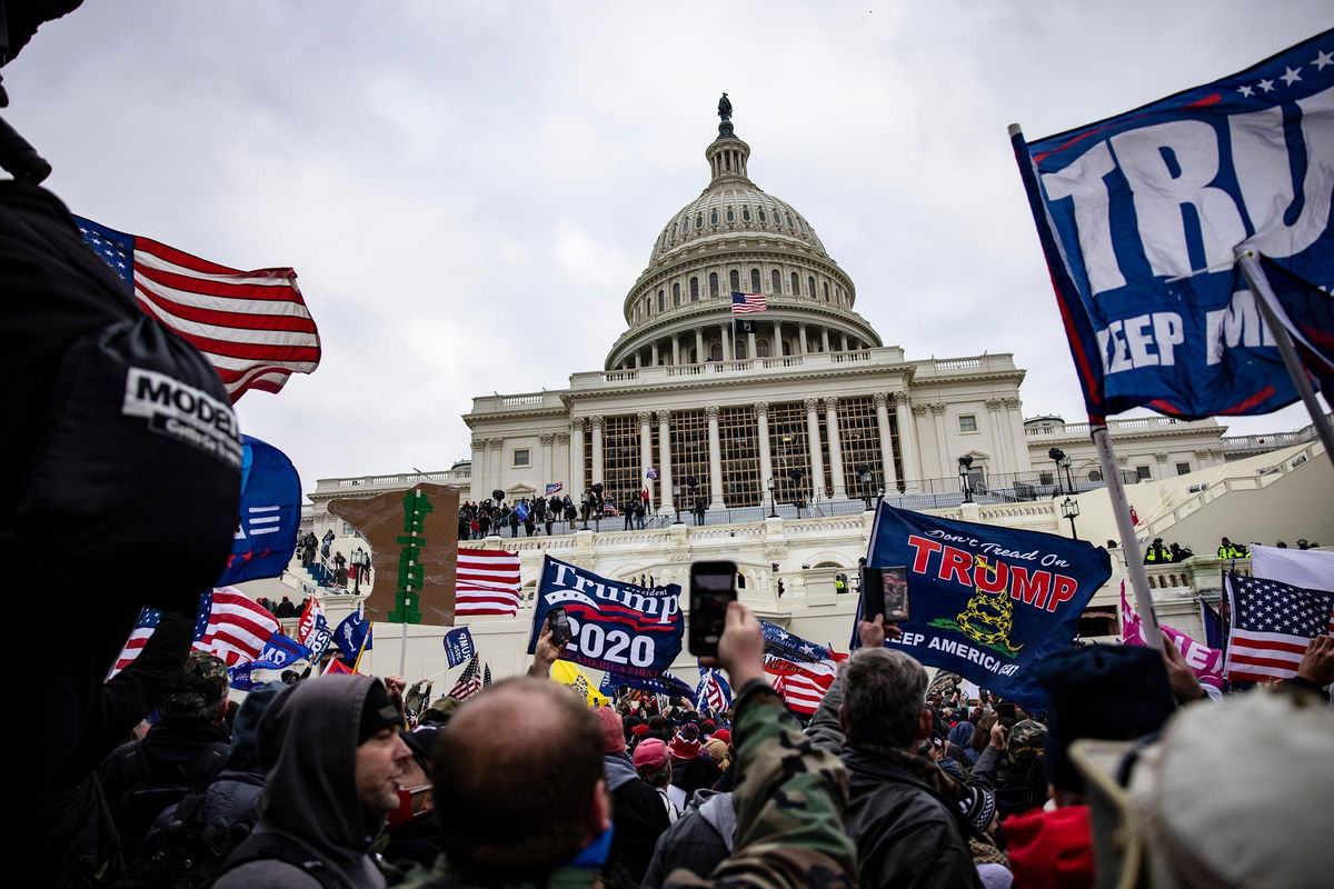 <i>Samuel Corum/Getty Images via CNN Newsource</i><br/>Pro-Trump supporters storm the US Capitol following a rally with President Donald Trump on January 6