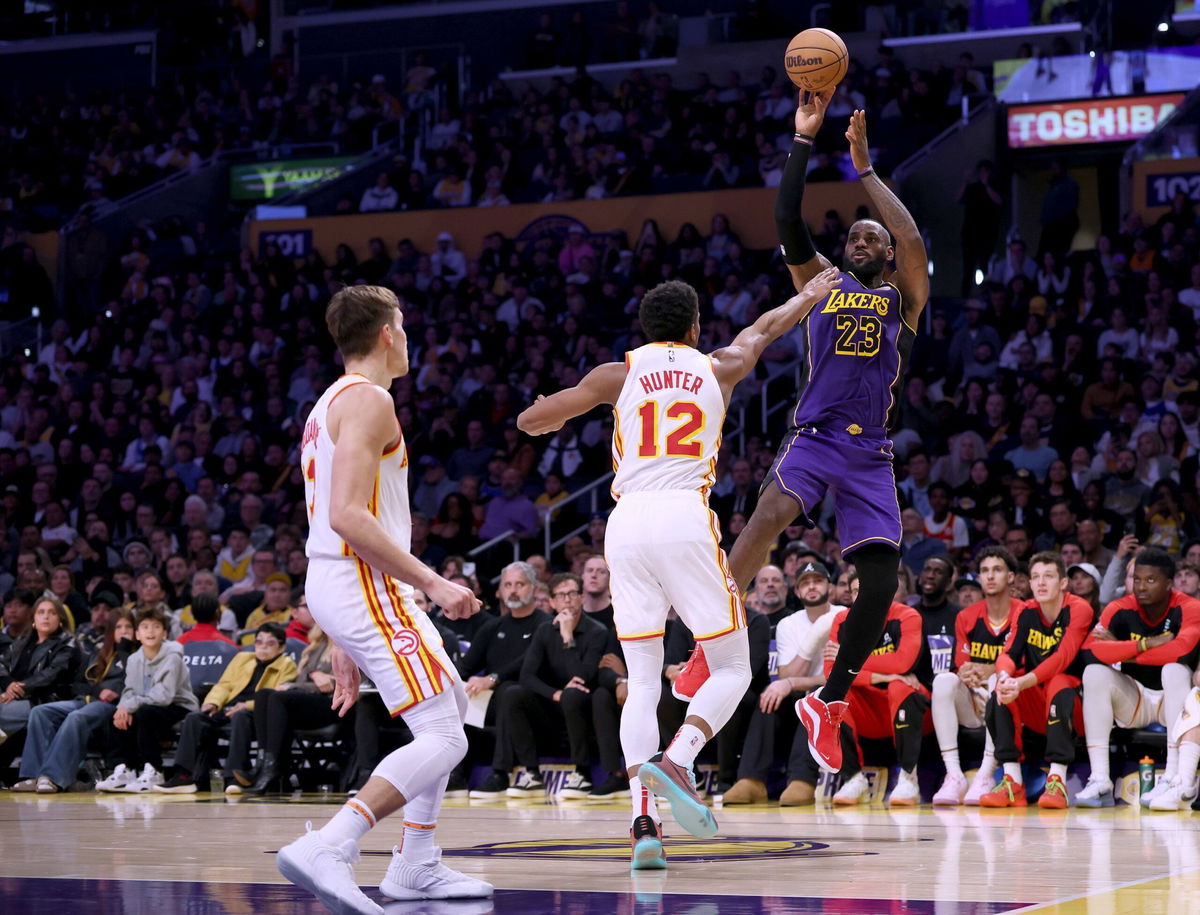 <i>Harry How/Getty Images via CNN Newsource</i><br/>LeBron James scoring on a jumper over De'Andre Hunter and Bogdan Bogdanovic of the Atlanta Hawks. James set another record on Friday as he surpassed the legendary Michael Jordan’s mark for the most 30-point games in NBA history.