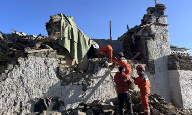 Rescue workers search for survivors in the aftermath of an earthquake in Changsuo Township of Dingri in Xigaze