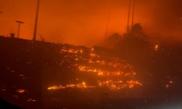 A CNN crew filmed the dangerous scene as they left the area of fast-moving fires in Southern Californa.