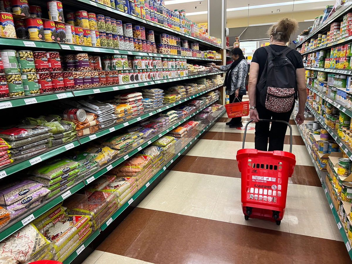 <i>Creative Touch Imaging Ltd./NurPhoto via Getty Images via CNN Newsource</i><br/>Shoppers are at a grocery store in Mississauga