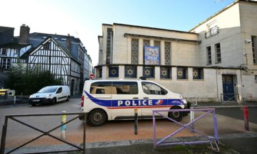 A police car outside a synagogue in Rouen