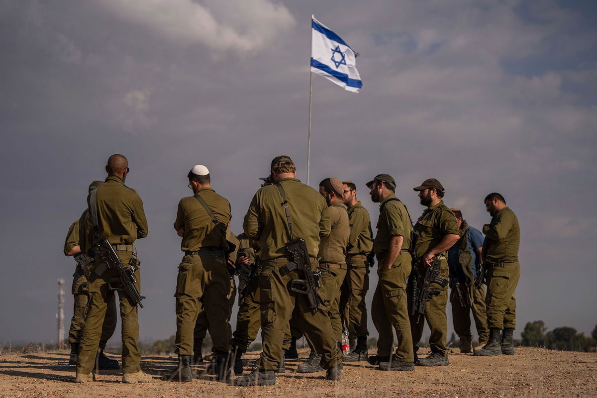 <i>Ohad Zwigenberg/AP via CNN Newsource</i><br/>Israeli soldiers on a hill close to the Gaza border in southern Israel