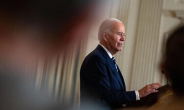 President Joe Biden speaks during a reception for new democratic members of the United States Congress in the State Dining Room of the White House on January 5