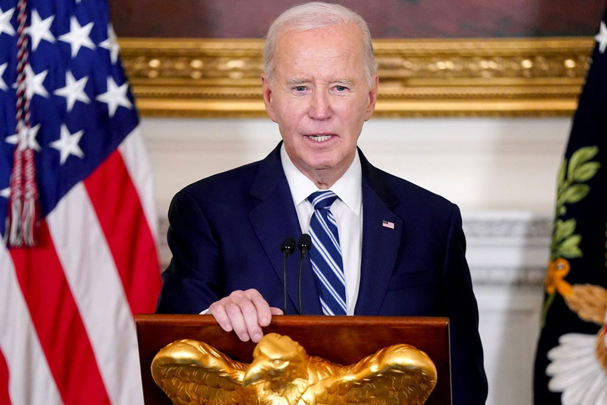 <i>Leigh Vogel/Abaca/Bloomberg/Getty Images via CNN Newsource</i><br/>US President Joe Biden speaks in the State Dining Room of the White House in Washington