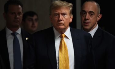 Former U.S. President Donald Trump returns after a break during his hush money trial at Manhattan Criminal Court in New York City on May 21