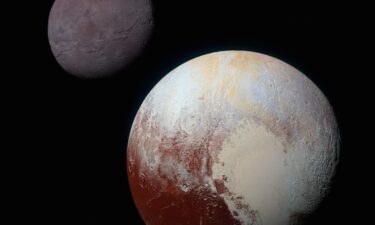 A composite of enhanced color images showcase Pluto (lower right) and its large moon Charon (upper left)