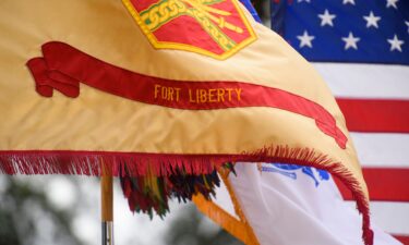 The U.S. Army garrison commands organizational Fort Liberty flag waves after a redesignation ceremony officially renaming the military installation on June 2