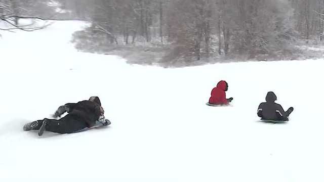 <i>WLKY via CNN Newsource</i><br/>Families fly down Louisville's most popular sledding hills.