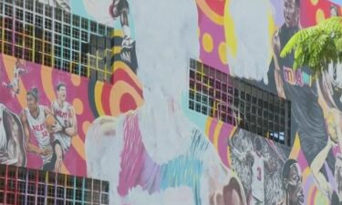 Artist Kyle Holbrook began repainting the mural this week