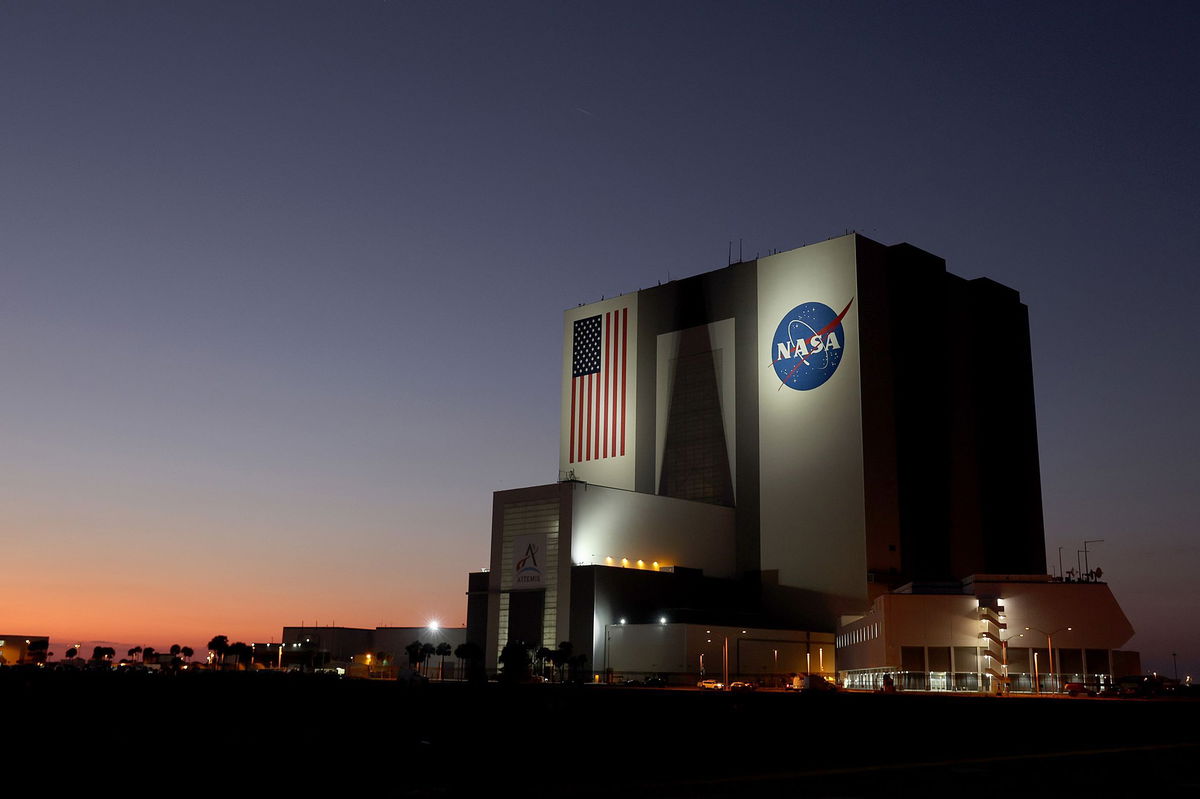 <i>Joe Raedle/Getty Images via CNN Newsource</i><br/>NASA's Vehicle Assembly Building is shown ahead of the launch of SpaceX Falcon 9 rocket with the Crew Dragon spacecraft at Kennedy Space Center in February 2023 in Cape Canaveral