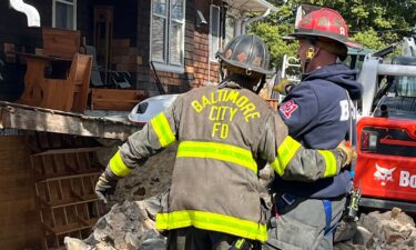 Two construction workers became trapped in Catonsville Friday afternoon