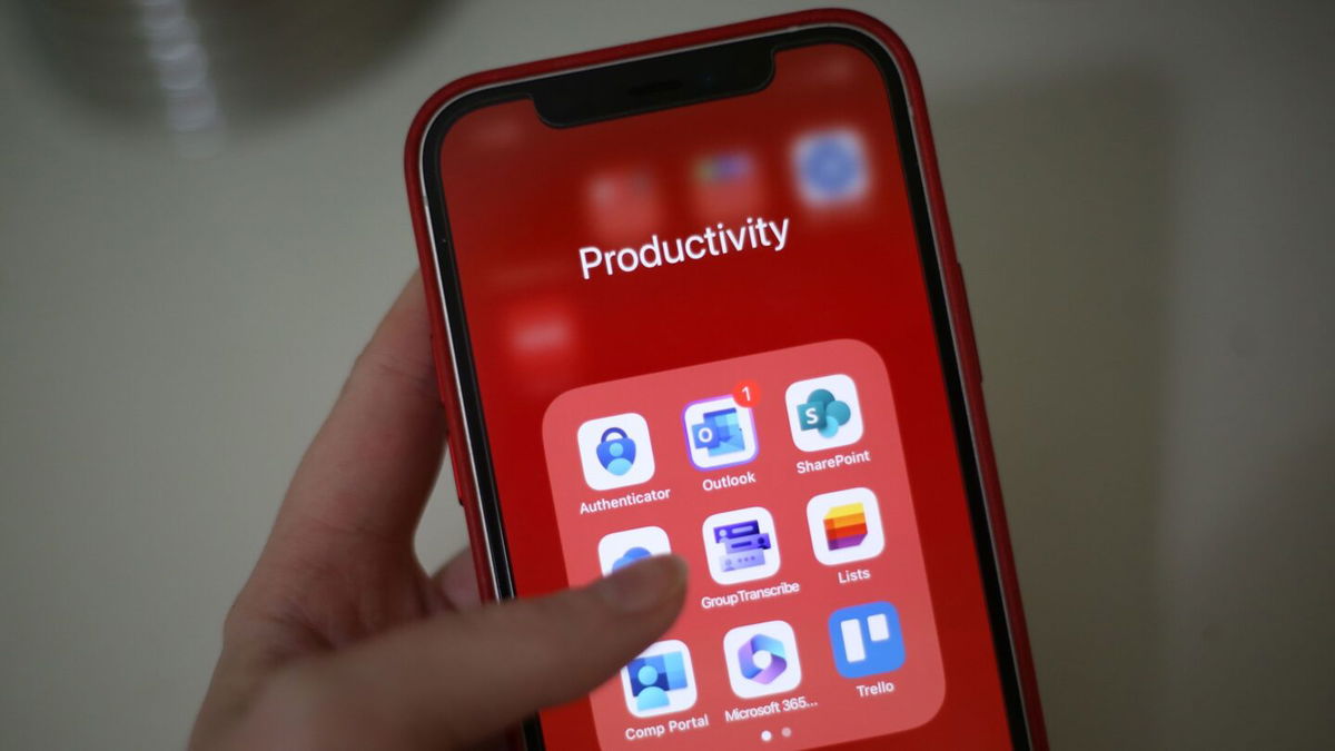 <i>Rebecca Wright/CNN via CNN Newsource</i><br/>Microsoft applications are seen on a phone in June 2023.