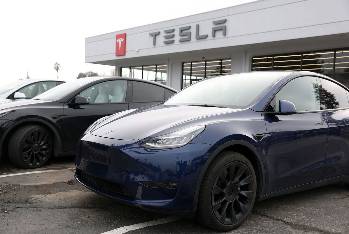 <i>Justin Sullivan/Getty Images/File via CNN Newsource</i><br/>New Tesla cars are displayed at a Tesla showroom in December 2024 in Corte Madera
