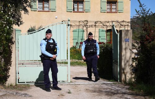 Gendarmes stand outside the house of the grandparents of Emile Solei in La Bouilladisse