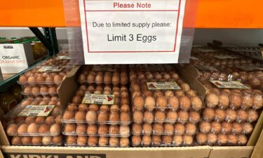 A limit sign hangs over a display of brown eggs in a Costco warehouse Thursday