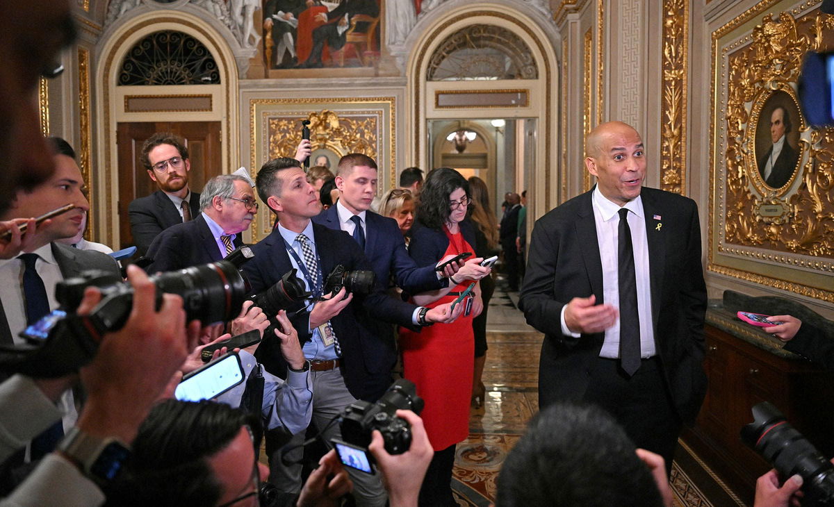 <i>Roberto Schmidt/AFP/Getty Images via CNN Newsource</i><br/>Cory Booker sets the record for the longest Senate speech on April 1 at the Capitol.