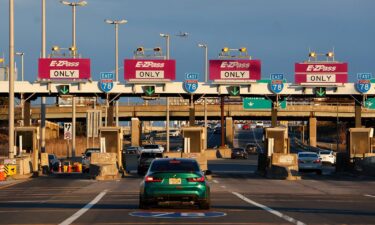 Vehicles travel though a toll plaza on the New Jersey Turnpike on March 1