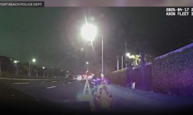 A video from the Newport Beach Police Department shows the brief scuffle that ultimately ended when an officer shot and killed a motorcyclist who stole his taser.