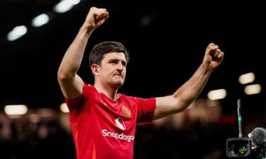 Harry Maguire celebrates after the tie against Olympique Lyon at Old Trafford on April 17.