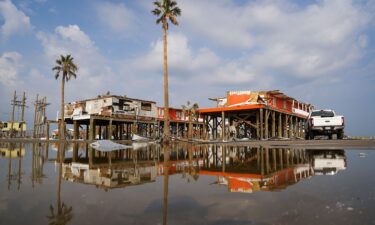 Storm damaged houses in flood water after Hurricane Ida on September 3