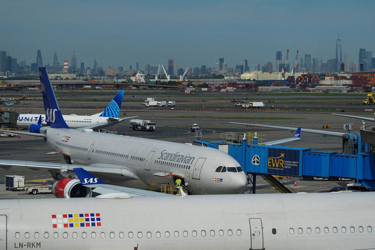 <i>Eduardo Munoz/Reuters/File via CNN Newsource</i><br/>A plane docks on the tarmac after an air traffic control outage