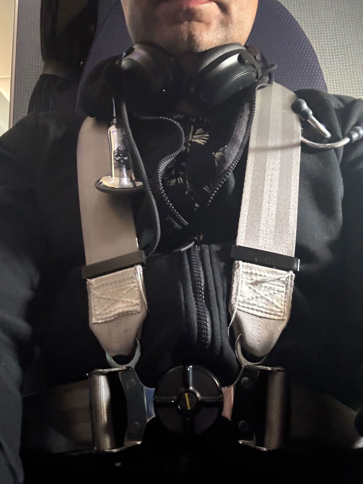 <i>Cura for the World via CNN Newsource</i><br/>Dr. TJ Trad sat in the jumper seat to give the flight crew updates.