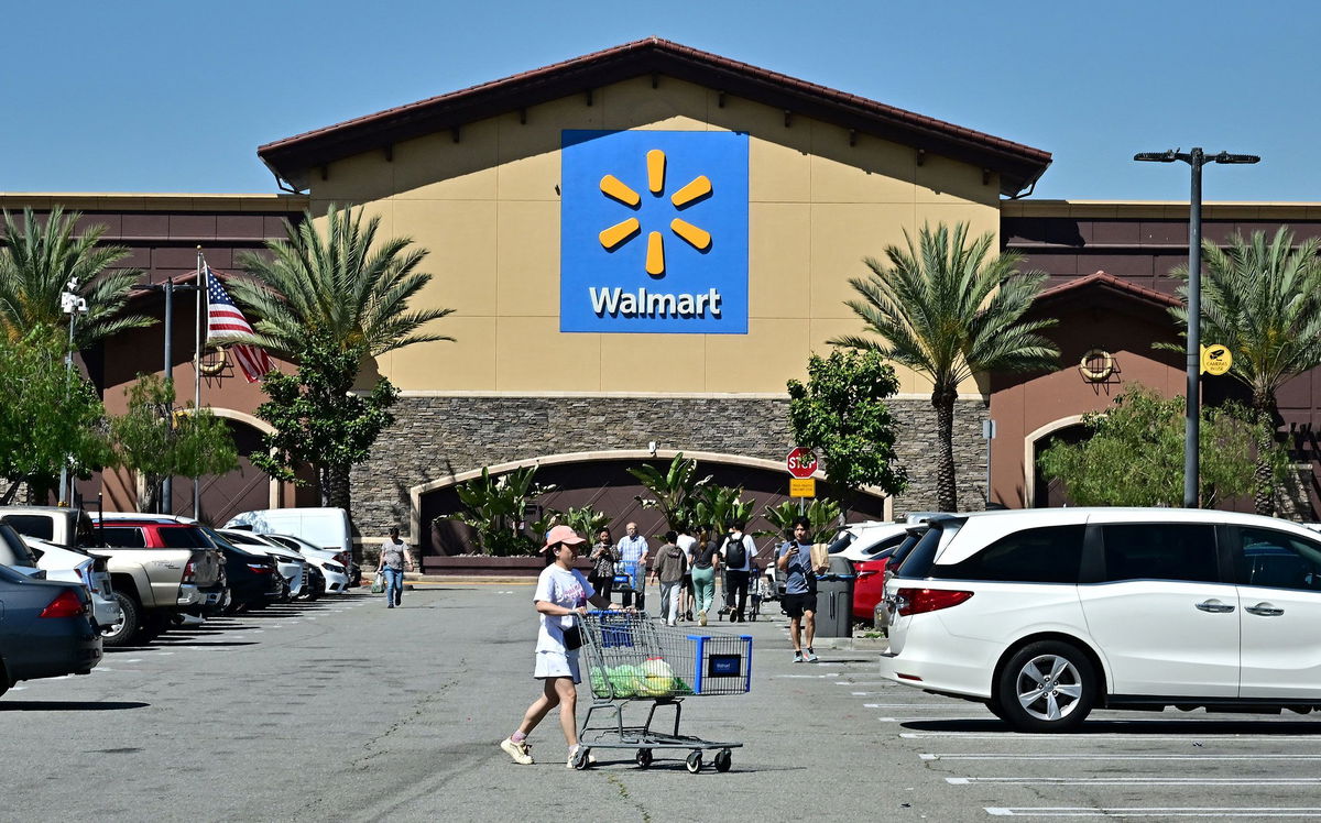 <i>Frederic J. Brown/AFP/Getty Images via CNN Newsource</i><br/>People shop at a Walmart in Rosemead