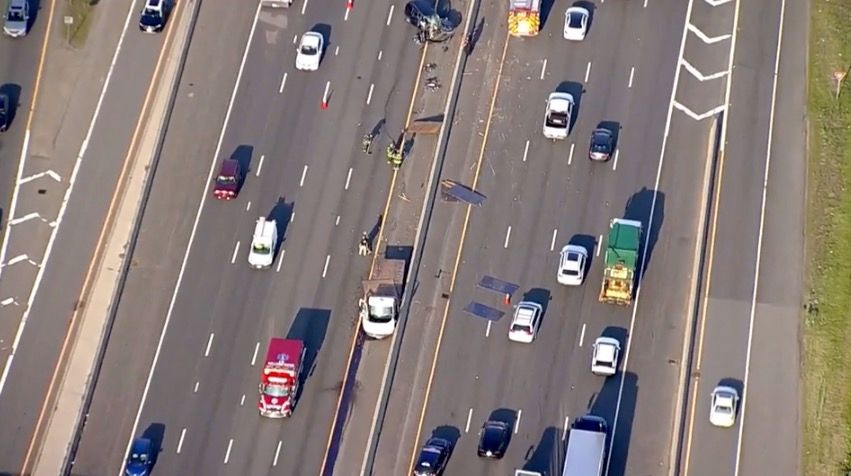 <i>WCVB via CNN Newsource</i><br/>A sport utility vehicle crashed into the back of a flatbed truck on Route 128 in Burlington