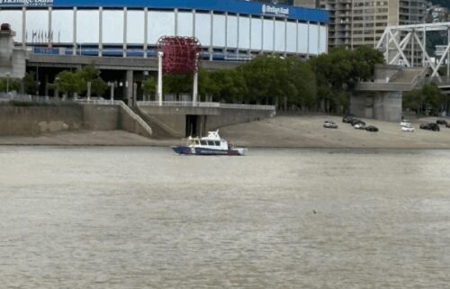 Recovery efforts continue for a motorcyclist who fell from Taylor Southgate Bridge after a crash.