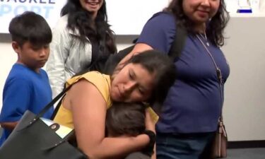Milwaukee teacher's aide chose to leave the United States with her 9-year-old twin daughters