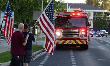 A procession from Kootenai Health headed to Spokane after a few firefighters were killed on Sunday.