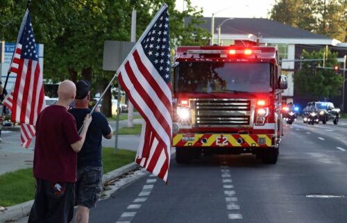 A procession from Kootenai Health headed to Spokane after a few firefighters were killed on Sunday.