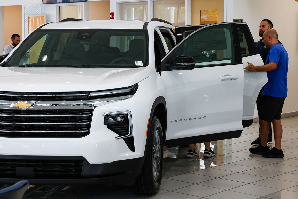 <i>Eva Marie Uzcategui/Bloomberg/Getty Images via CNN Newsource</i><br/>A customer views a new Chevrolet Traverse vehicle for sale at a Chevrolet dealership in Miami