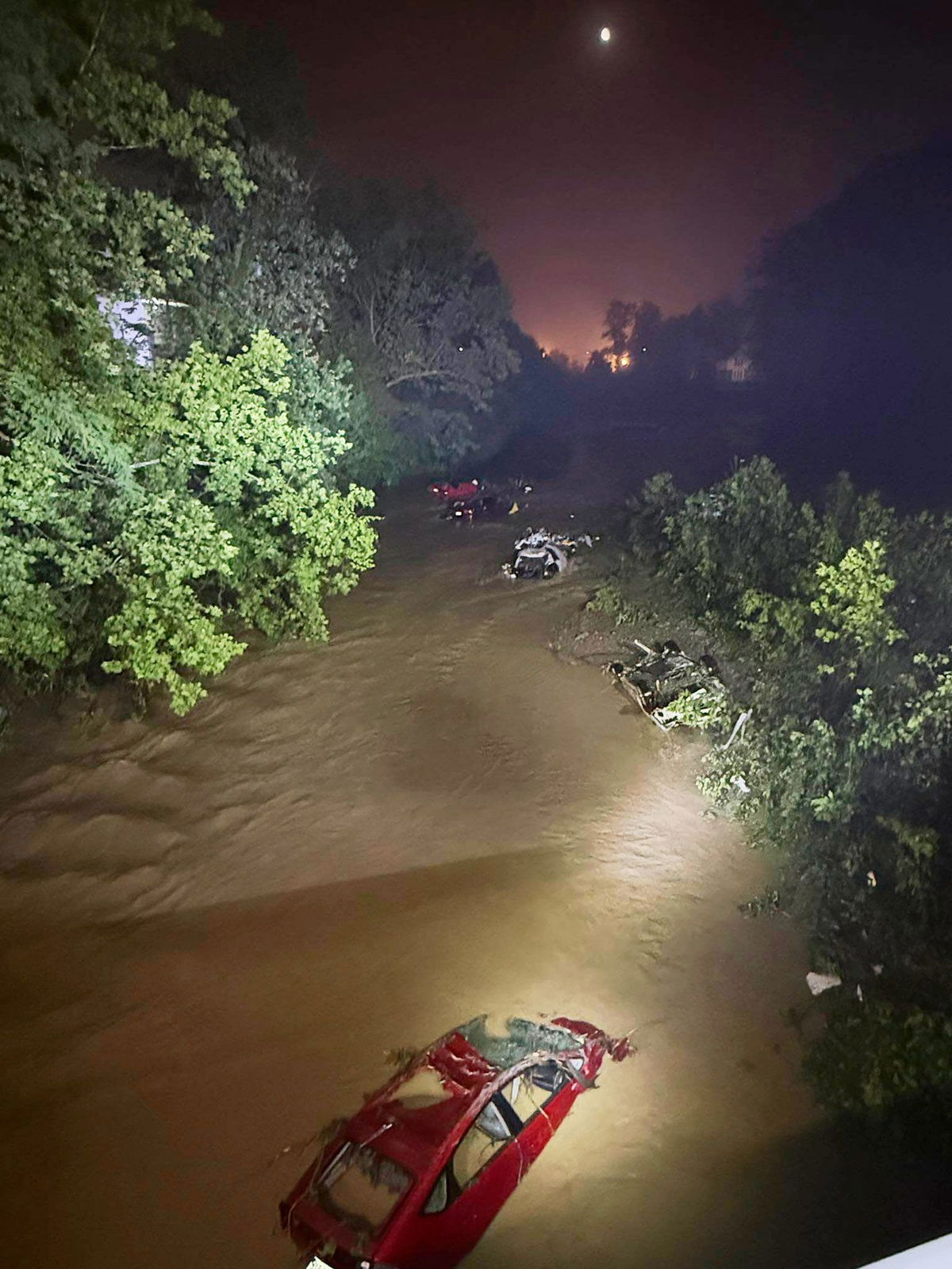 <i>Wheeling West Virginia Fire Department/AP via CNN Newsource</i><br/>At least 4 dead in West Virginia flooding as search continues for several missing after approximately 2.5 to 4 inches of rain fell within about a half hour in Ohio County