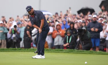 J.J. Spaun putts on the 18th green to win during the final round of the U.S. Open golf tournament.