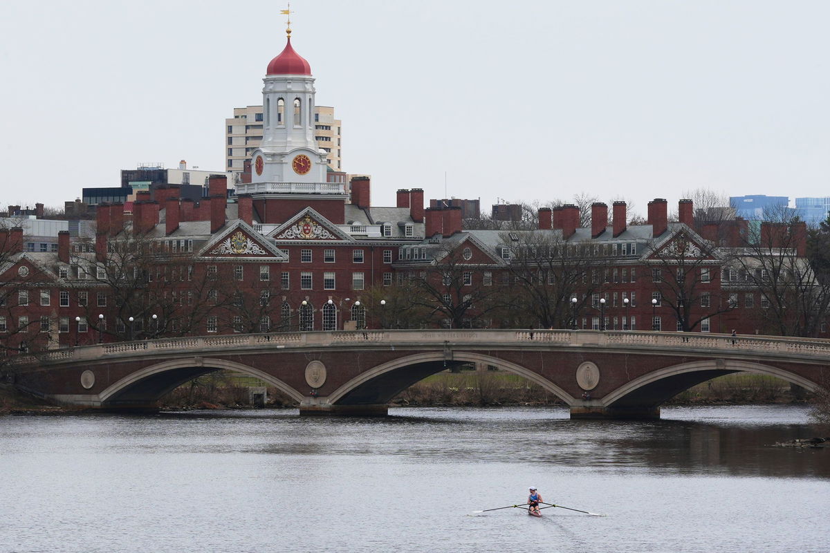 <i>Charles Krupa/AP via CNN Newsource</i><br/>A sculler rows down the Charles River near Harvard University