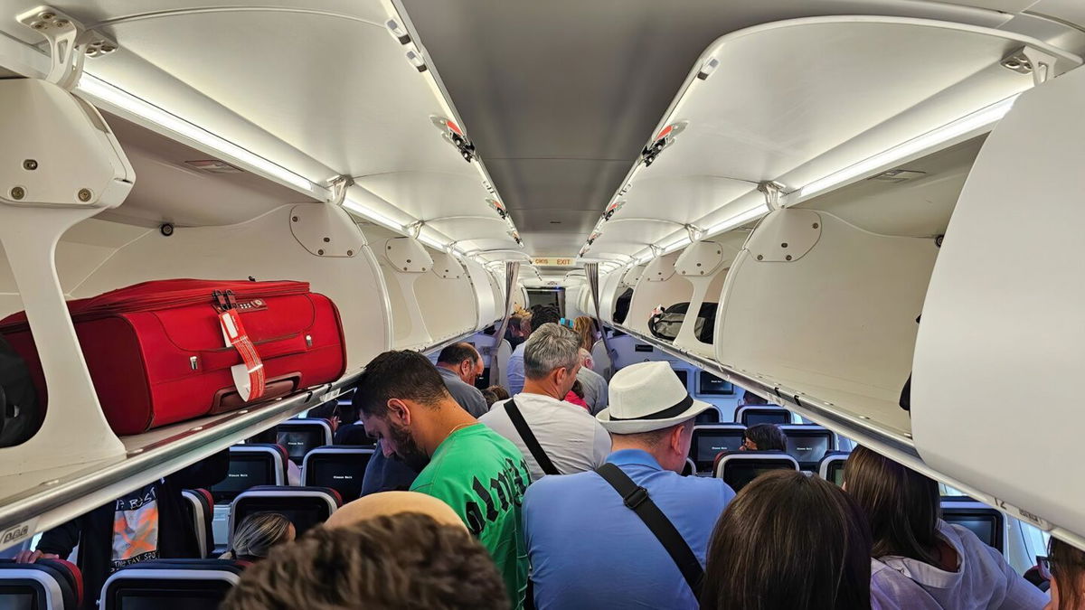 <i>CanY71/iStock Editorial/Getty Images via CNN Newsource</i><br/>Disputes sometimes break out over the storage of luggage in overhead bins.