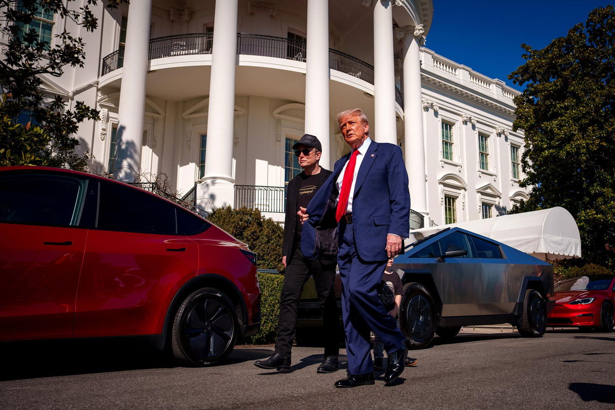 <i>Andrew Harnik/Getty Images via CNN Newsource</i><br/>President Donald Trump and Elon Musk depart after looking at Tesla vehicles on the South Lawn of the White House on March 11