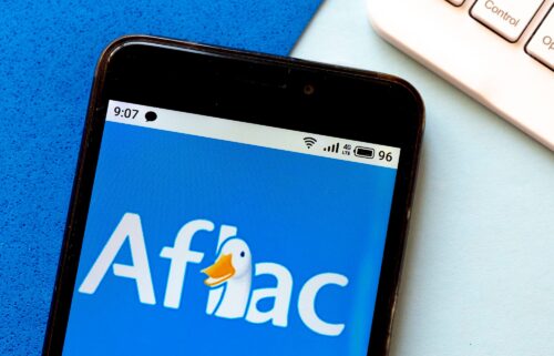 In this photo illustration an Aflac logo is seen displayed on a smartphone.