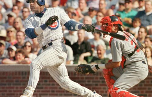 Sammy Sosa hits a home run at Wrigley Field against the St. Louis Cardinals in 1999.