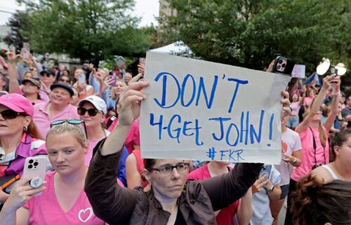 Karen Read supporters cheer for her outside Norfolk Superior Court on June 18. One sign holder implores people not to forget John O'Keefe after the jury delivered its verdict in her murder retrial.