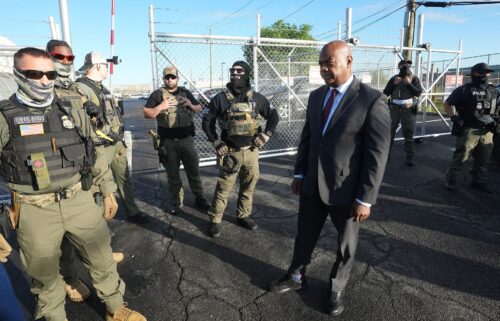 Mayor Ras Baraka of Newark confronts ICE agents at a demonstration outside an immigrant detention center in Elizabeth