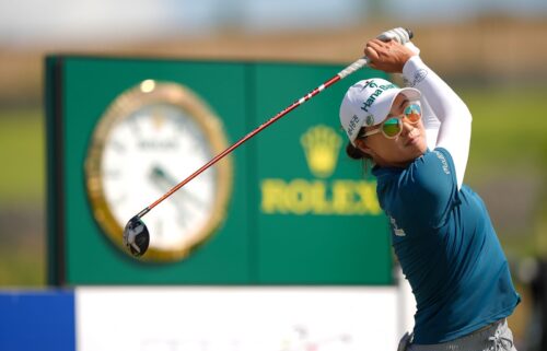 Lee battled strong winds and high temperatures to win her third career major.