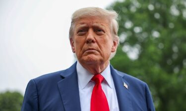U.S. President Donald Trump stops and talks to the media before he boards Marine One on the South Lawn at the White House on June 15 in Washington