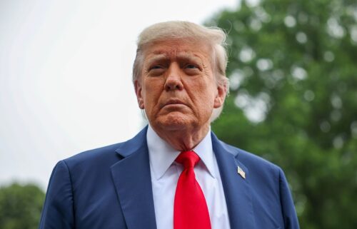 U.S. President Donald Trump stops and talks to the media before he boards Marine One on the South Lawn at the White House on June 15 in Washington