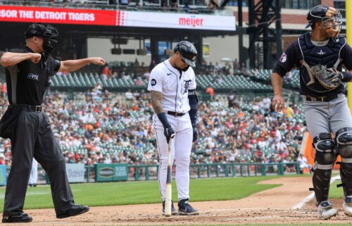 Báez looks down after being called out on strikes by home plate umpire Chris Segal during the first inning of a game in August 2022.