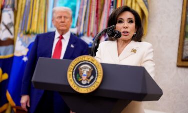 President Donald Trump looks on as interim US Attorney Jeanine Pirro speaks during her swearing-in ceremony in the Oval Office on May 28. Trump is nominating Pirro to a full term as the top federal prosecutor in Washington