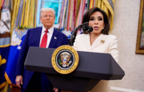 President Donald Trump looks on as interim US Attorney Jeanine Pirro speaks during her swearing-in ceremony in the Oval Office on May 28. Trump is nominating Pirro to a full term as the top federal prosecutor in Washington